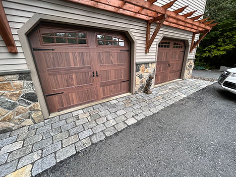 Granite cobblestone apron in front of a garage, in a driveway, in Dover VT