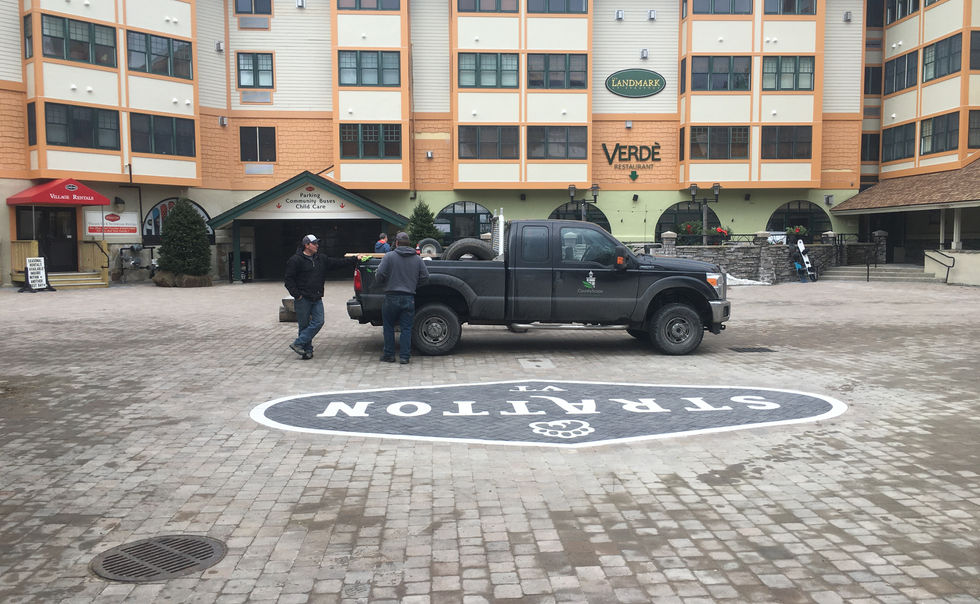 The paver courtyard, featuring a custom paver logo, at the Stratton Mountain Resort in Stratton, VT