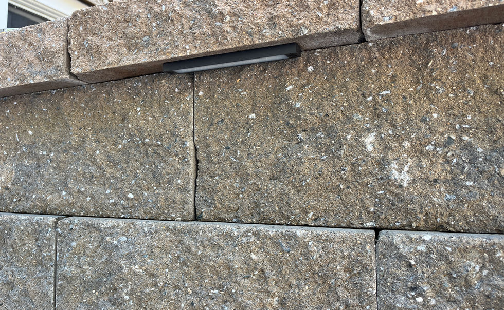 Ideal block retaining walls, and Ideal Paver patio with Granite Steps, landscape lighting and plantings in Bernardston MA