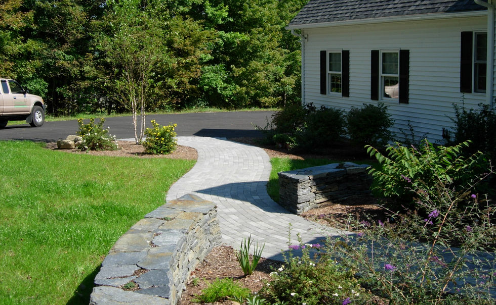 Creative Goshen Stone walls with a curved Ideal Paver walkway and plantings in Conway, MA
