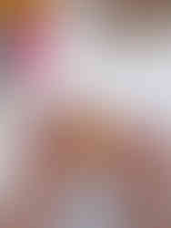 Felting yellow wool to a bee brooch base