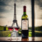 A bottle of French wine with the Eiffel Tower in the background