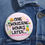 Thumbnail: Nautical Nonsense inspired button pin with text that reads "One Thousand Hours Later Registered Dietitian"