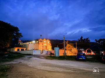 Historic temple at the base of Skandagiri Hills, a spiritual stop before the sunrise trek, surrounded by lush greenery, offering a serene cultural start to the popular Karnataka hiking trail.