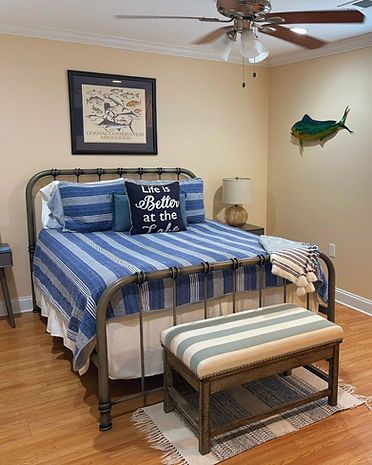 Camp Big Daddy's master bedroom with nautical decor