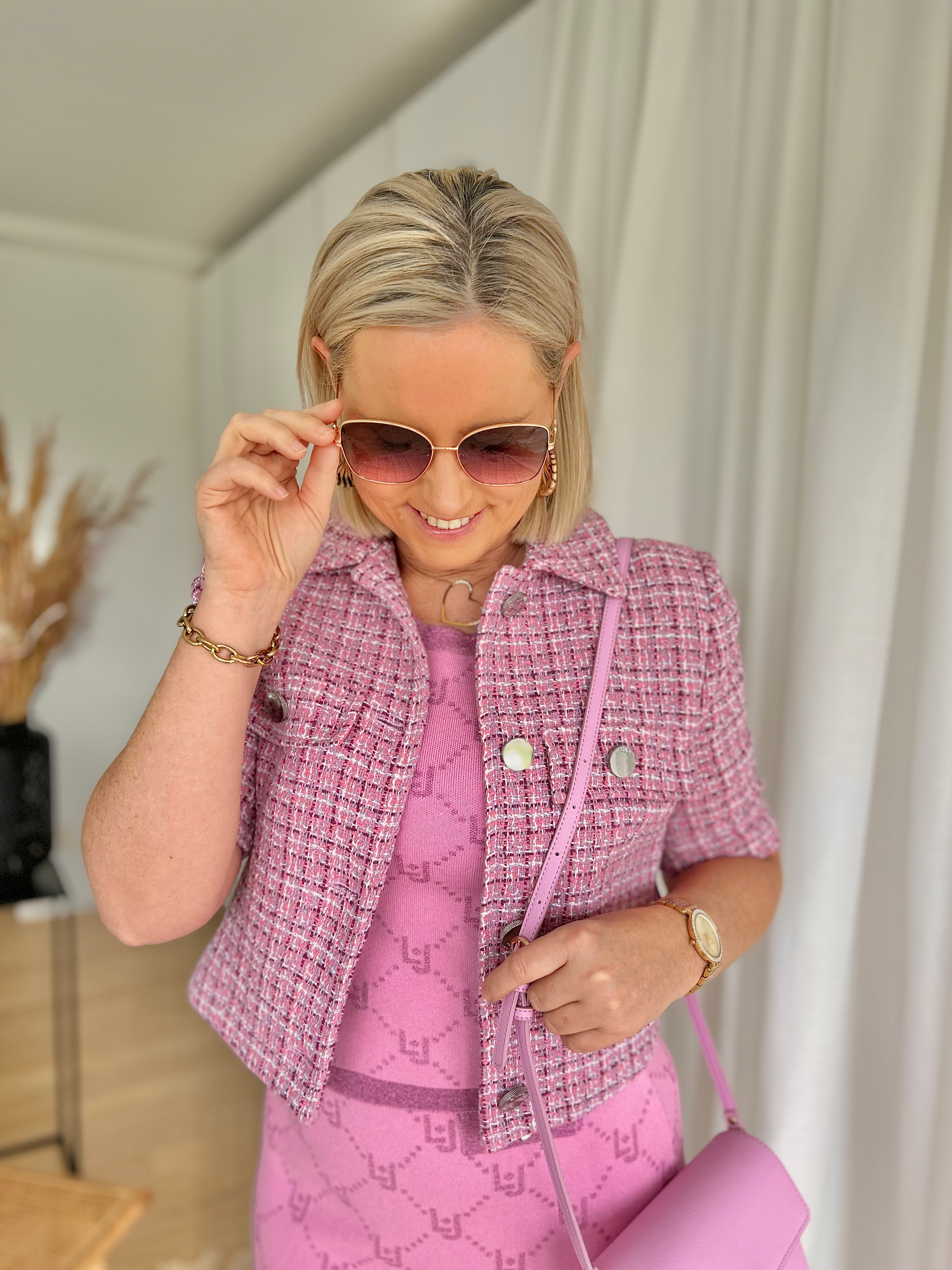 63595 Kort roze bouclé jasje Liu Jo