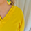 Thumbnail: 66431 Gele v-hals blouse op rek met stropje Her.