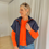 Thumbnail: 67303 Donkerblauwe bodywarmer jas met fluo oranje rits M-I