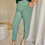Thumbnail: 65301 Mintgroene broek chino-model met knoopsluiting en rek achteraan Marie Méro
