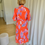 Thumbnail: 66875 Lange oranje jurk met paarse multicolor print stretch-kwaliteit K-Design