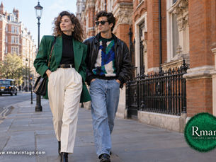 Woman and man wearing 1980s-inspired vintage fashion on a London street, with the Rmar Vintage Limited logo.