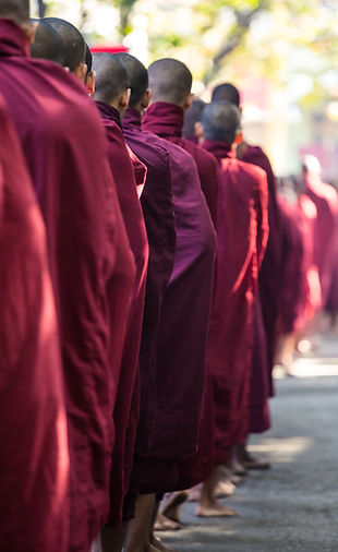 Buddhist Monks Queuing for Meal