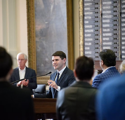 Talarico at Podium 1.png