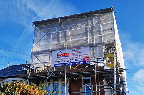 RGB Construction scaffolding around a house in Cardiff during insurance work claim restoration.