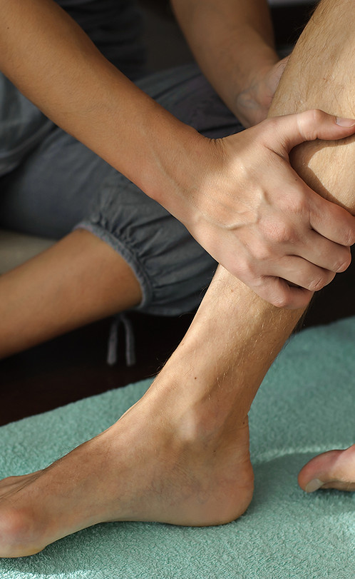 Leg massage therapy session