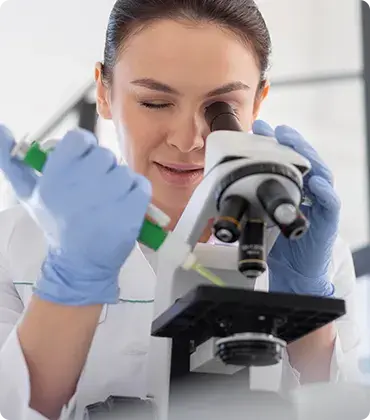 scientist-working-microscope-1.webp