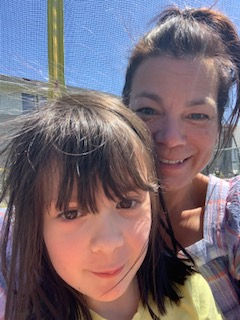 A photo of Oakleigh and Miss Marcy outside