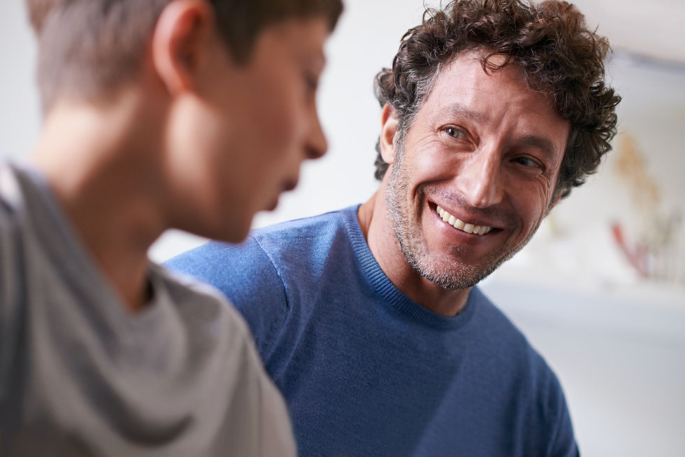 Dad supporting his son who has Autism