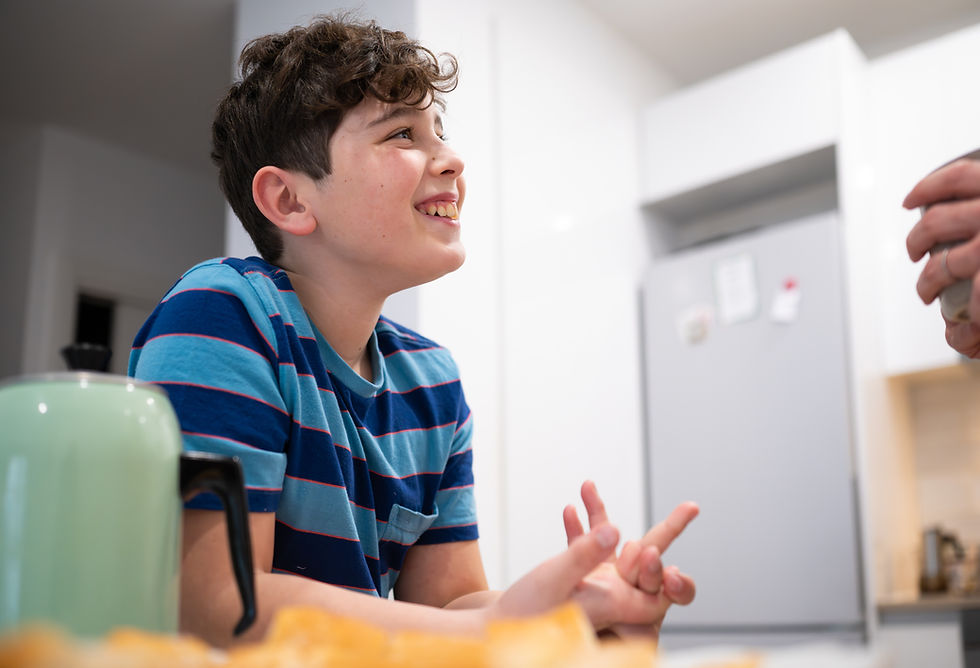happy young person smiling at independent visitor