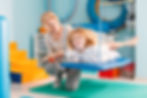 Child with occupational therapist