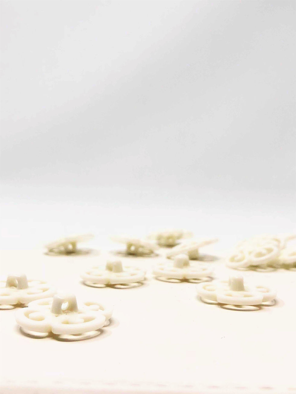 Thumbnail: 1 Inch White Plastic Floral Shank Button -10 Pieces Per Order-