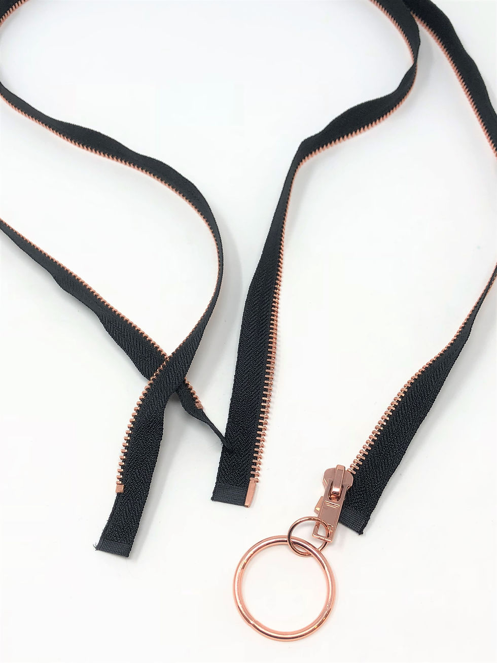 Thumbnail: O-Ring Detachable Copper Jacket Zippers on Black Tape in 36 or 52 Inches