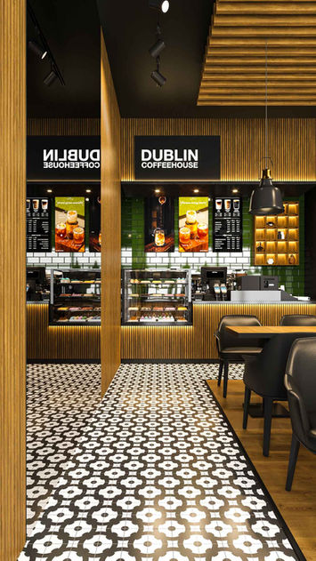 Stylish coffe shop design with warm lighting and wood finish details, Dublin Coffee House - Gokhan Dogan