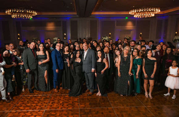 Group photo of attendees at a corporate gala in Orlando