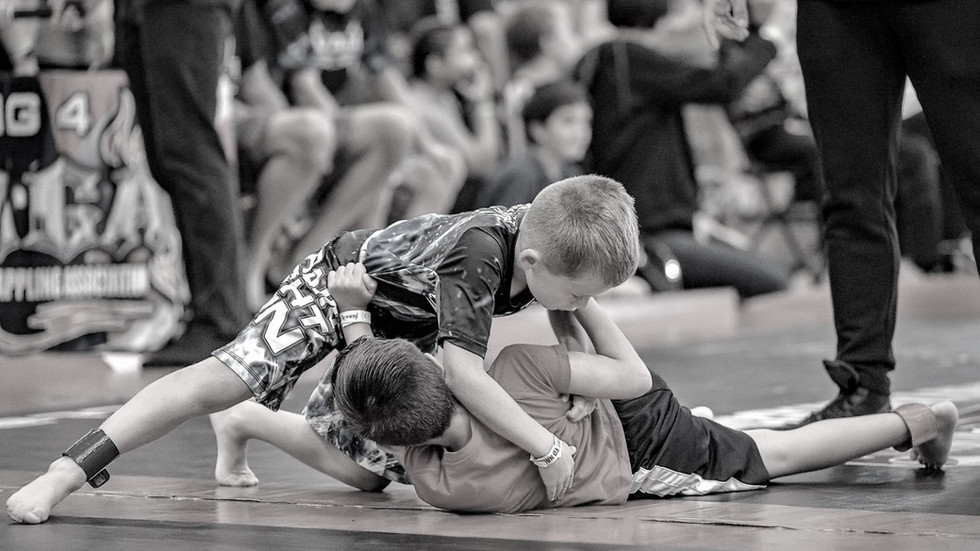 Kids Jiu Jitsu tournament action for Seamless Progression Academy