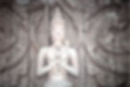 Figura de un Deva juntando las manos