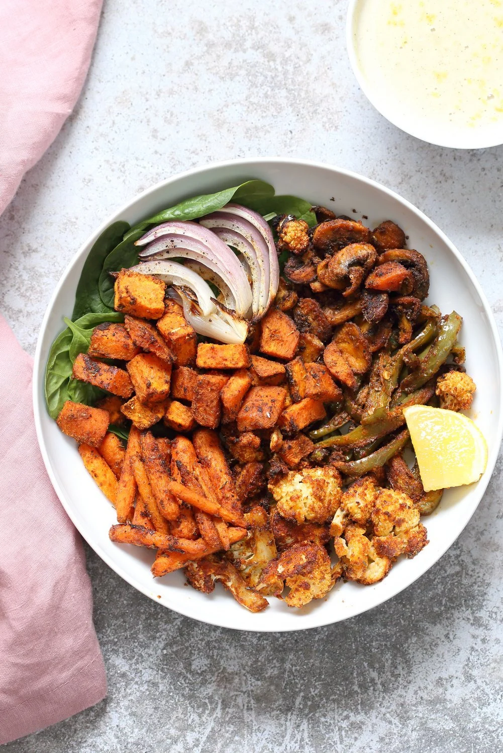 Vegan-Cajun-spiced-roasted-vegetable-bowl-with-garlic-sauce-veganricha-5422.webp