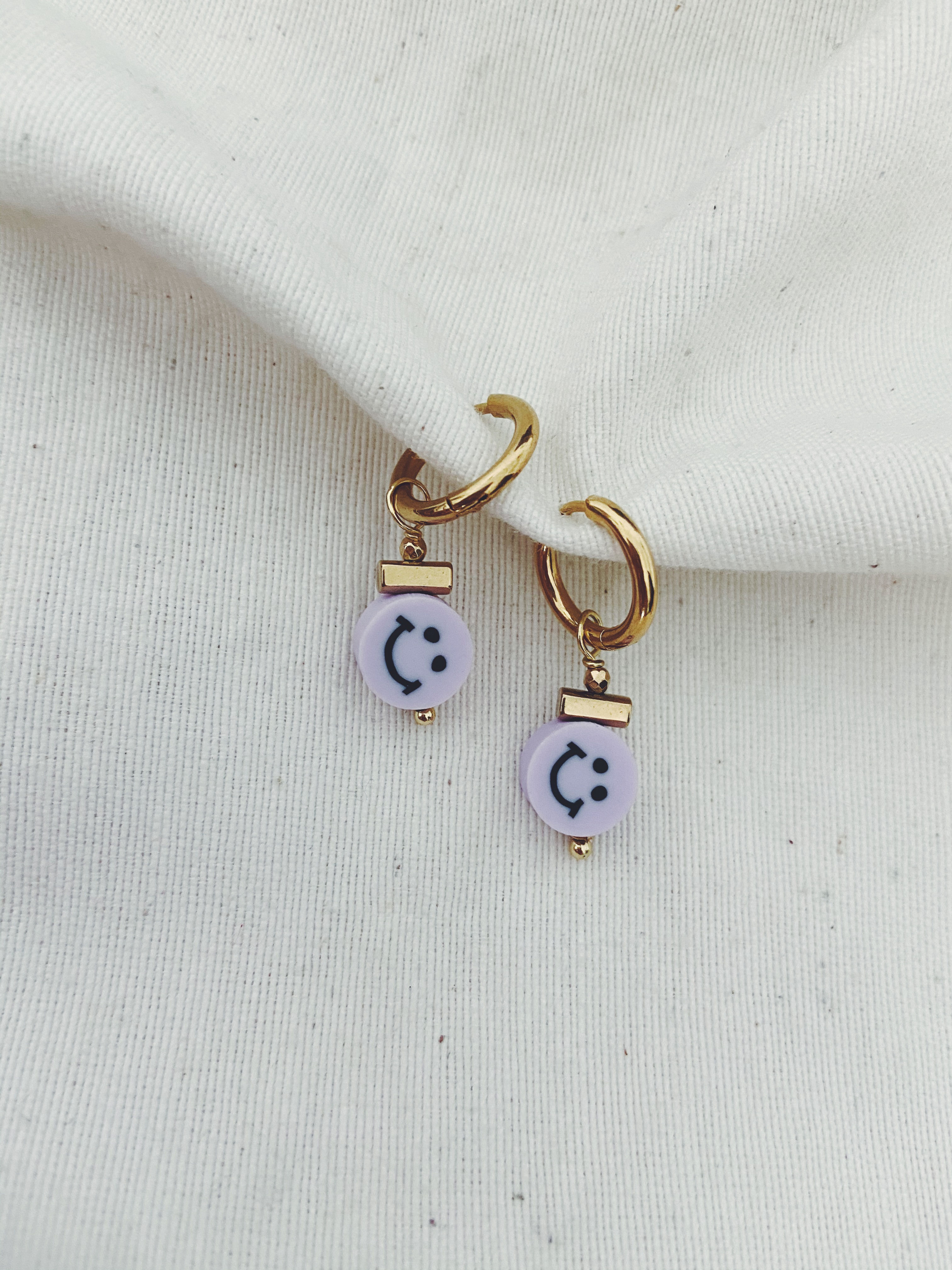 Arito cara feliz lila