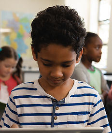 Schoolboy Using Tablet  _edited.jpg