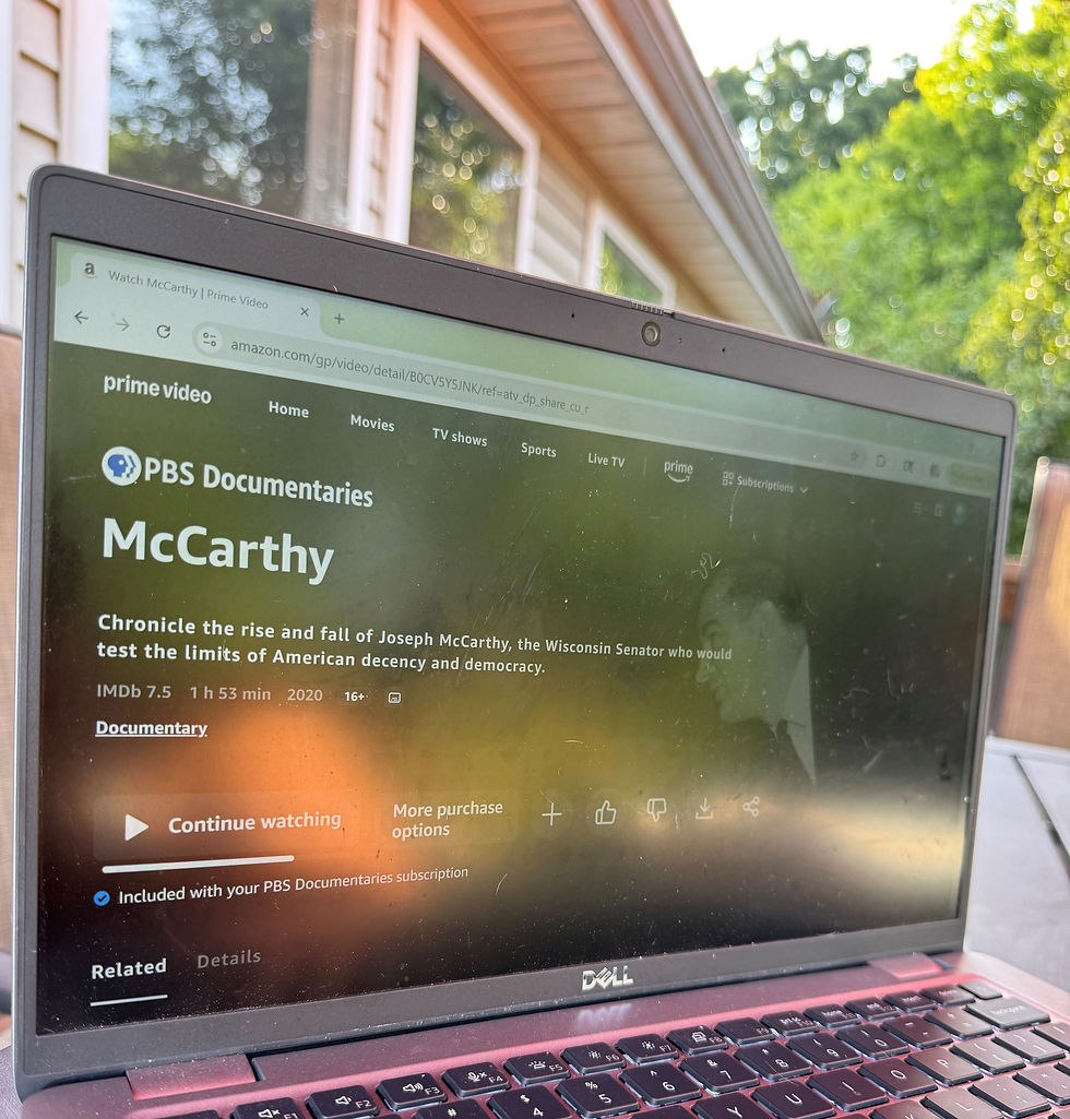 Laptop opened and displaying a web page with the word, McCarthy on it