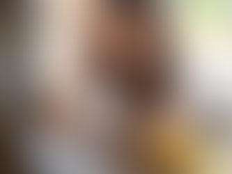 Woman looking at laptop confused