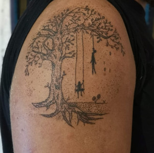 Hand poke tattoo of tree of live. Done at Tattoostudio Ubud