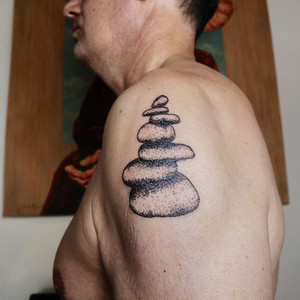 hand poke tattoo. stones done at tattoostudio in Ubud