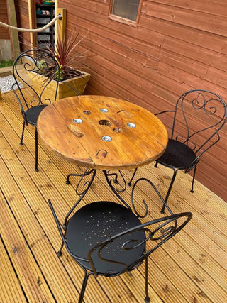 Garden furniture, consisting of a wooden table with three chairs