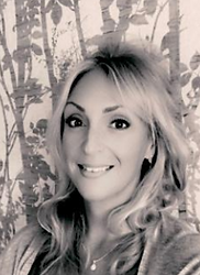 “Elizabeth Warden, principal artist at E J Tile Design, specialising in bespoke hand‑painted ceramic tiles and custom splashback murals.”