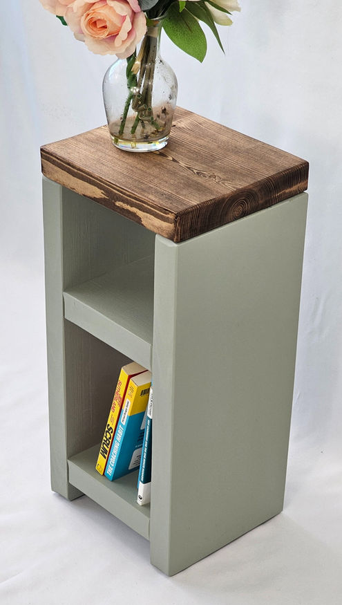 side view of wooden bedside table with dark oak top and olive base