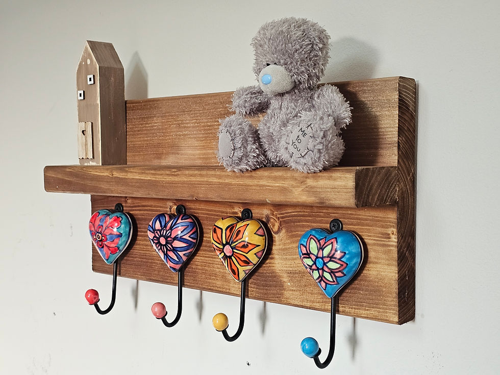 Rustic wooden coat rack with ceramic heart hooks