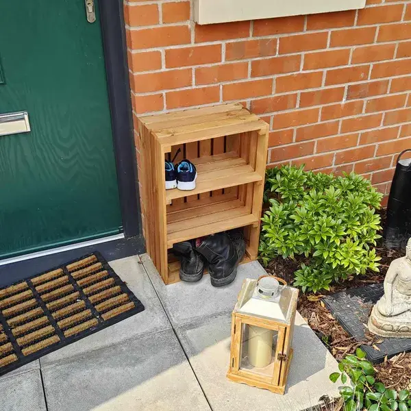 Large wooden crate with shelves for home storage