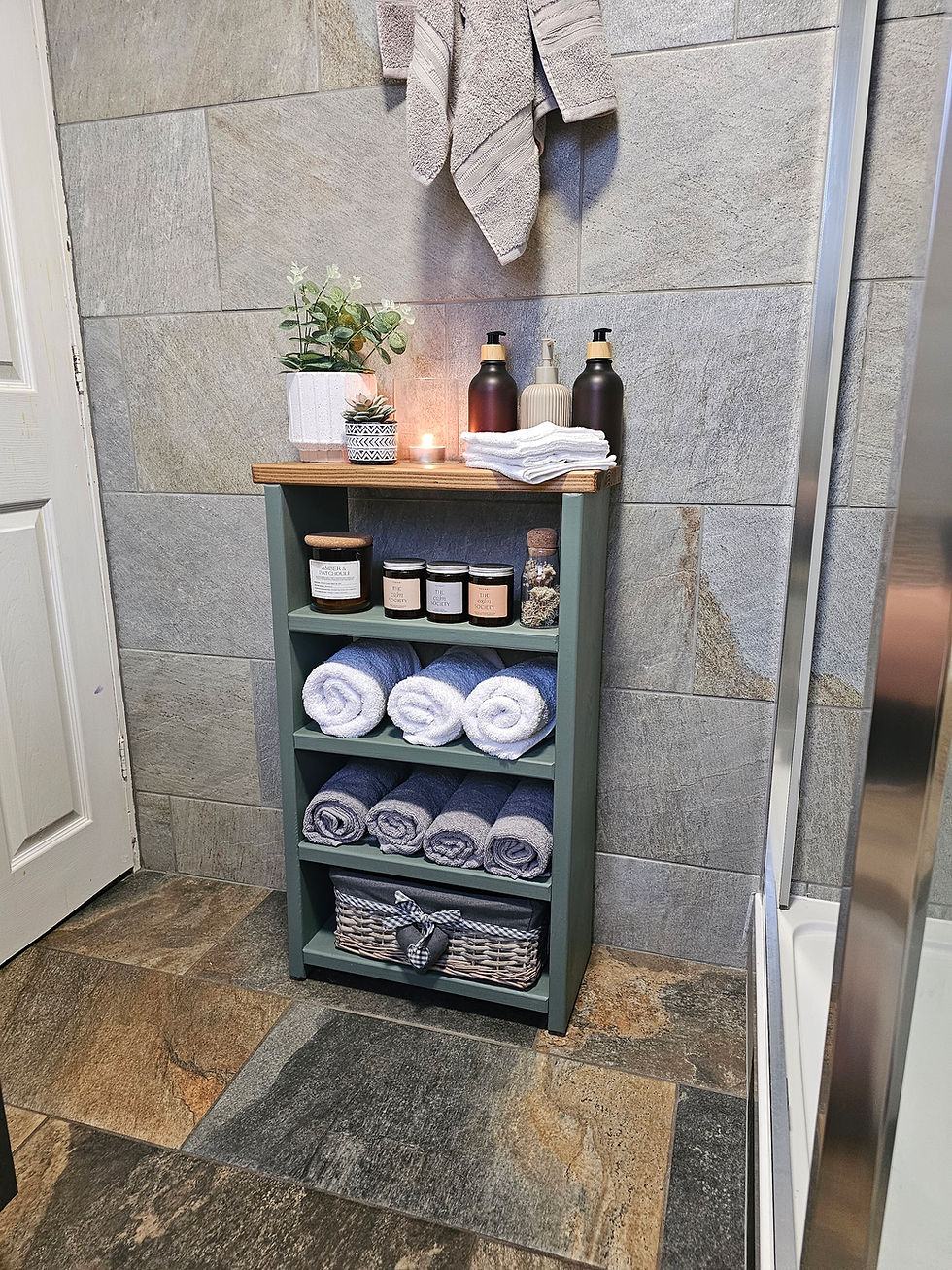 Slim solid wood bathroom storage unit with four shelves