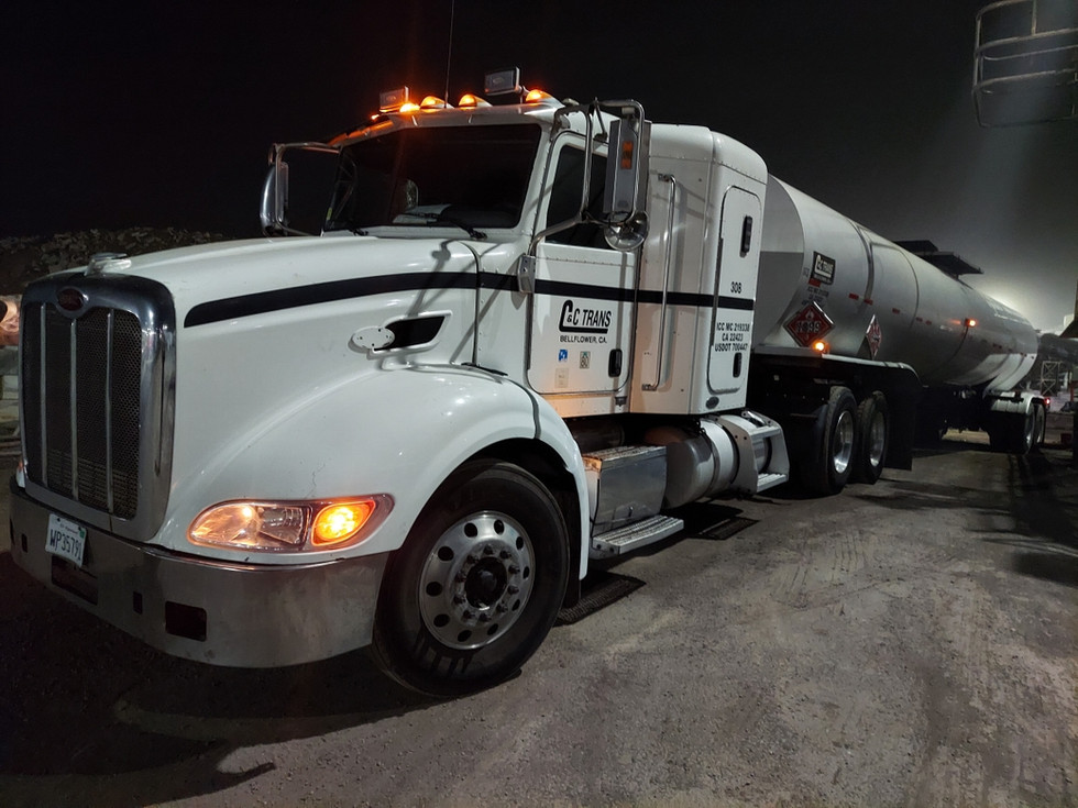c and c trans truck at an oil refinery