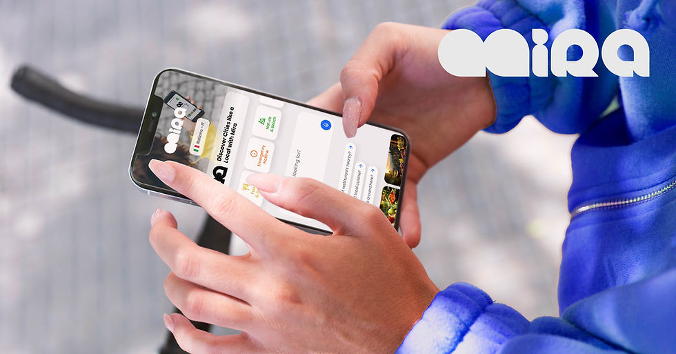 Hands with long nails hold a smartphone displaying the Mira app. The person wears a blue jacket. Background is blurred.