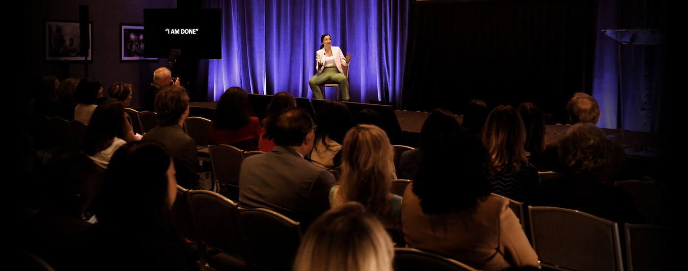alicia-korten-workplace-culture-keynote-speaker-seated-on-mainstage-.jpg