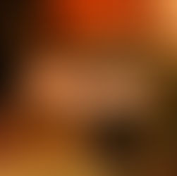 Cozy restaurant in Albufeira, Algarve with round tables, beige chairs, green booths, and red walls. Tv showing live sports games.