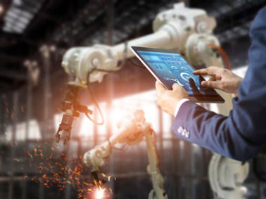 manager-industrial-engineer-using-tablet-check-control-automation-robot-arms-machine_34200