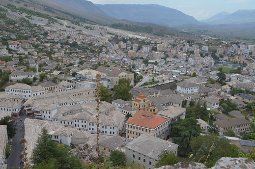 Gjirokaster, panorama, stone mansions, stone roofs, mountains