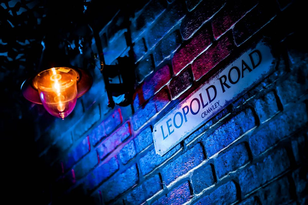A simple scene of a light and a sign, and yet it feels so dramatic. How?
